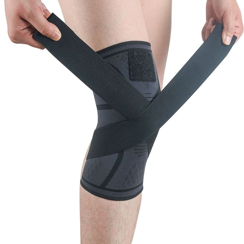 Manga de rodilla de compresión tejida con correa